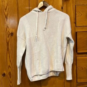 White knitted sweater from Cynthia Rowley.
